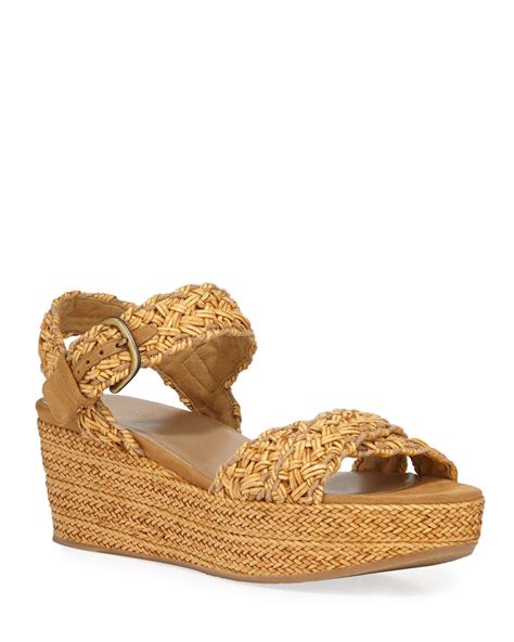 Woven raffia platform sandals .